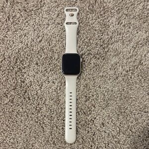 Apple Smartwatch with White Band Worn 4 times Looks New 44m Aluminum & GPS